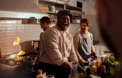 Chef cooking in commercial range oven